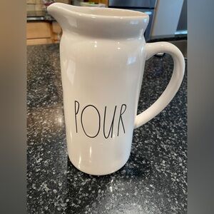 Rae Dunn “POUR” pitcher. 10” height, 4.5 in round. Like new. Used as decor only.